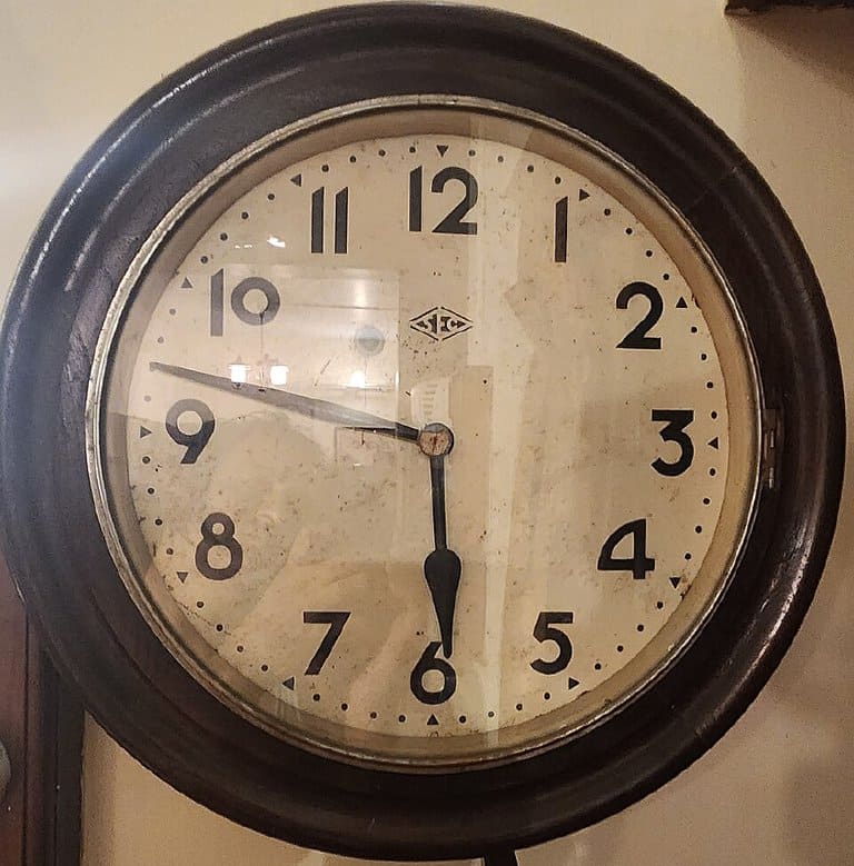 An antique wall clock.