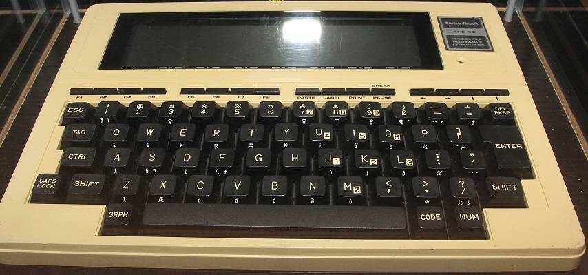The TRS-80 Model 100 portable computer's keyboard is larger than its built-in screen.